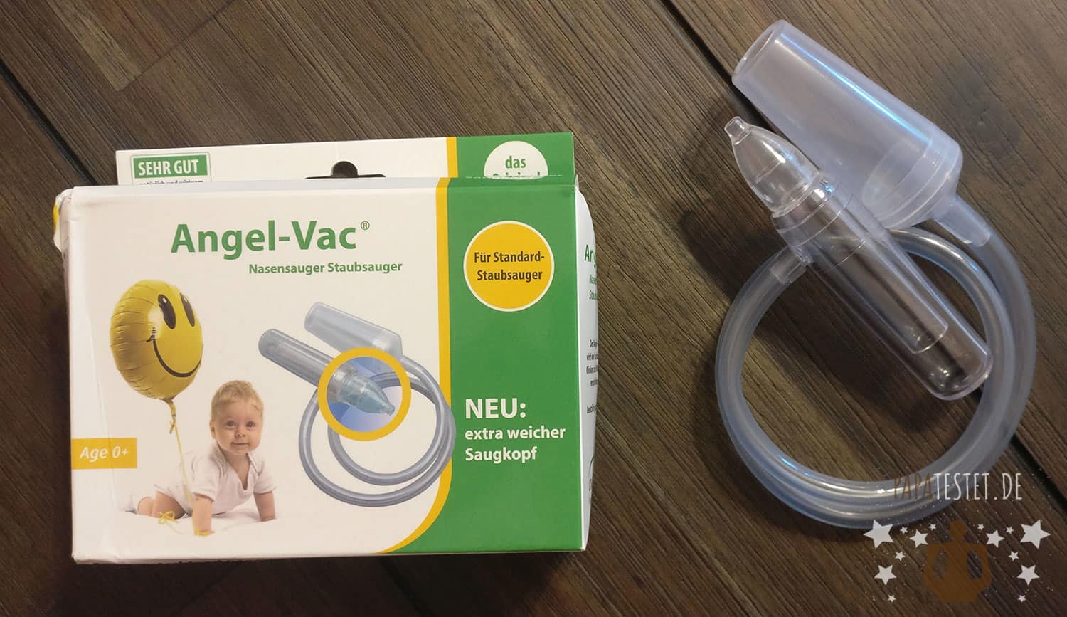 Der Angel-Vac Staubsauger-Nasensauger neben der Verpackung